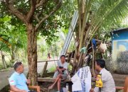 Bhabinkamtibmas Desa Lebani Pasang Baligho Himbauan, Cegah Penangkapan Ikan Pakai Setrum   